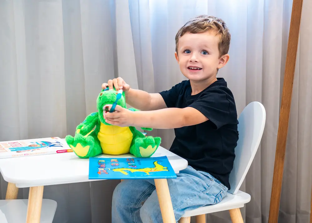 Image of a pediatric dentist providing care to a child
